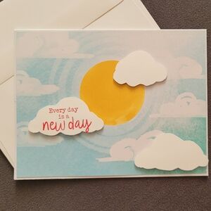 Inspirational Greeting Card with Clouds and Sun
